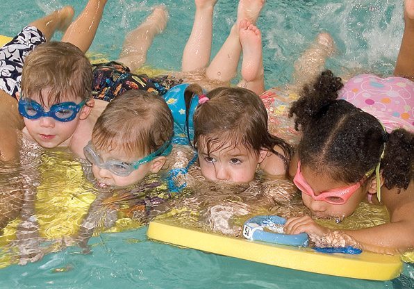 Swimming Class Kids on Floating Duck Mat